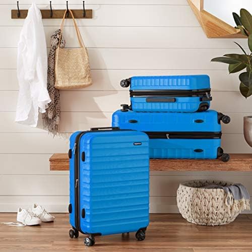 Amazon Basics Hard Shell Large Suitcase - Expandable ABS Travel Luggage with 4 Double Spinner Wheels - Scratch Resistant and Lightweight Construction - 78 x 52.6 x 32cm - Light Blue - Image 7